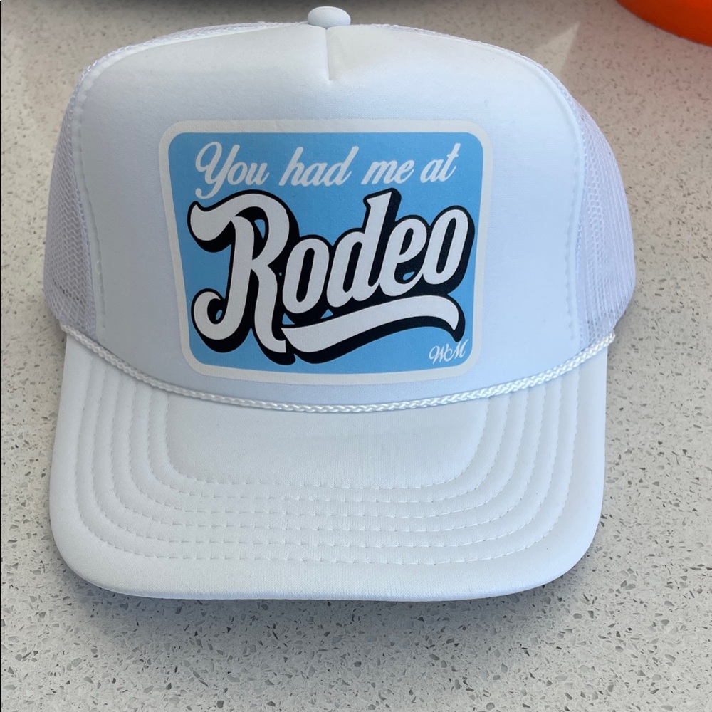 YOU HAD ME AT RODEO White & Blue Trucker Hat